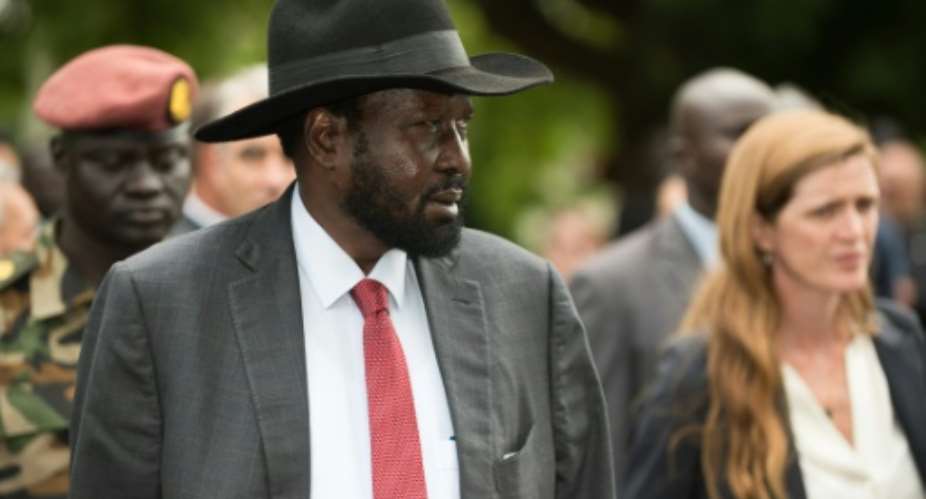 South Sudan President Salva Kiir L takes US Ambassador to the UN Samantha Power on a tour of the state house to show damage from fighting in July.  By Charles Atiki Lomodong AFPFile