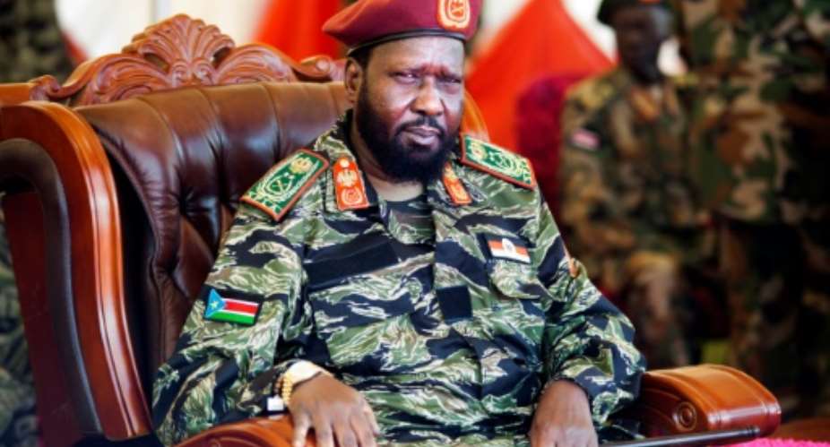 South Sudan President Salva Kiir, pictured on May 18, 2107, has vowed the army will lay down arms, but warned that his troops would defend themselves if attacked.  By ALBERT GONZALEZ FARRAN AFPFile