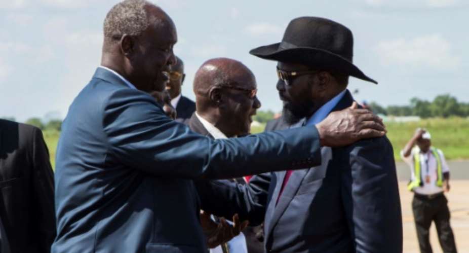 South Sudan President Salva Kiir R has pledged that his government will respect a tenuous peace agreement for the country.  By Akuot Chol AFP