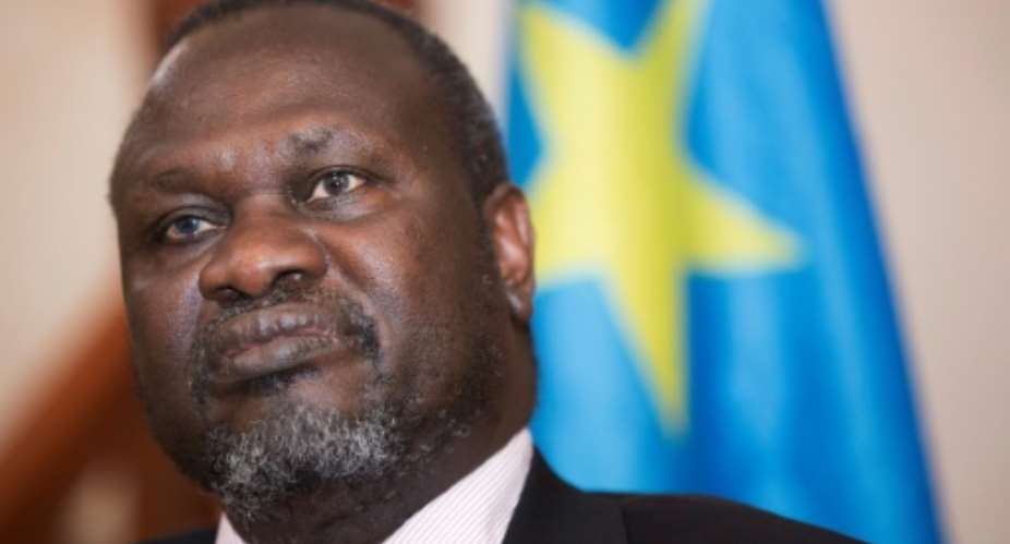 South Sudan's labour minister Gabriel Duop Lam joined a unity government last year as a member of the opposition headed by rebel leader Riek Machar pictured.  By Zacharias ABUBEKER AFPFile