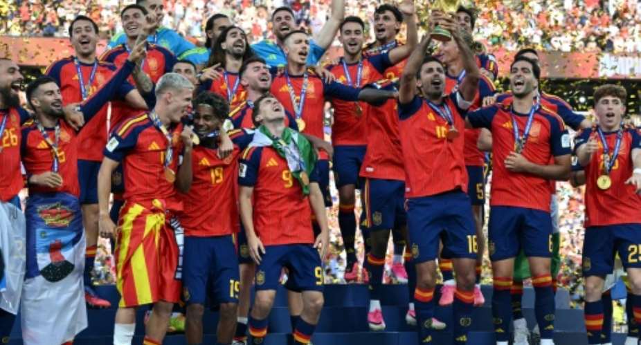 Spain captain Rodri lifts the World Cup trophy.  By Mandel NGAN (AFP)