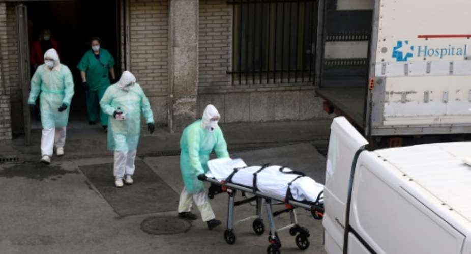 Spain joined Italy today in seeing its death toll from the coronavirus epidemic surpass that of China.  By OSCAR DEL POZO AFP