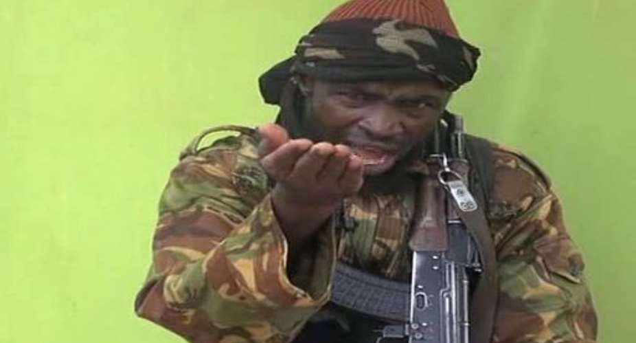 Boko Haram leader Abubakar Shekau, seen in a video released by the Nigerian Islamist group on May 12, 2014.  By  Boko HaramAFPFile