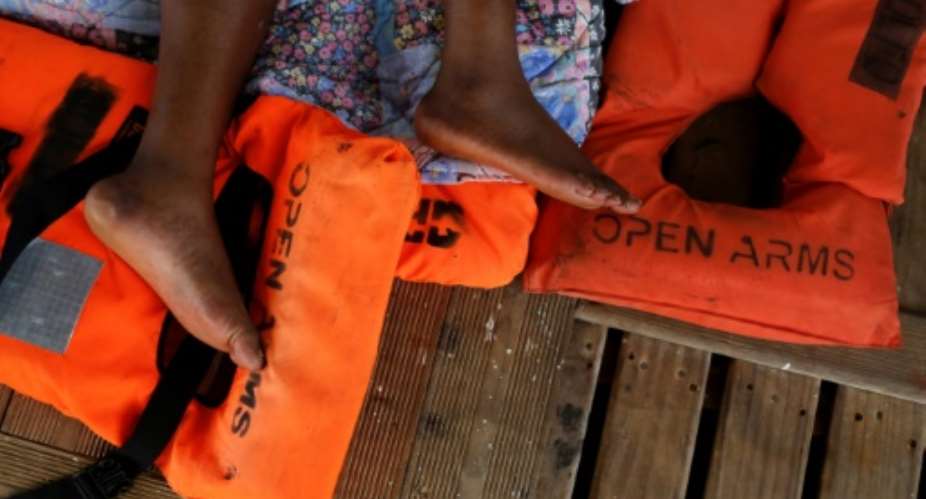 Spanish aid group Proactiva Open Arms, which helped a Spanish fishing vessel rescue the migrants like this one pictured July 2018, told AFP that one young man suffering from dehydration had to be evacuated to Malta.  By PAU BARRENA AFPFile