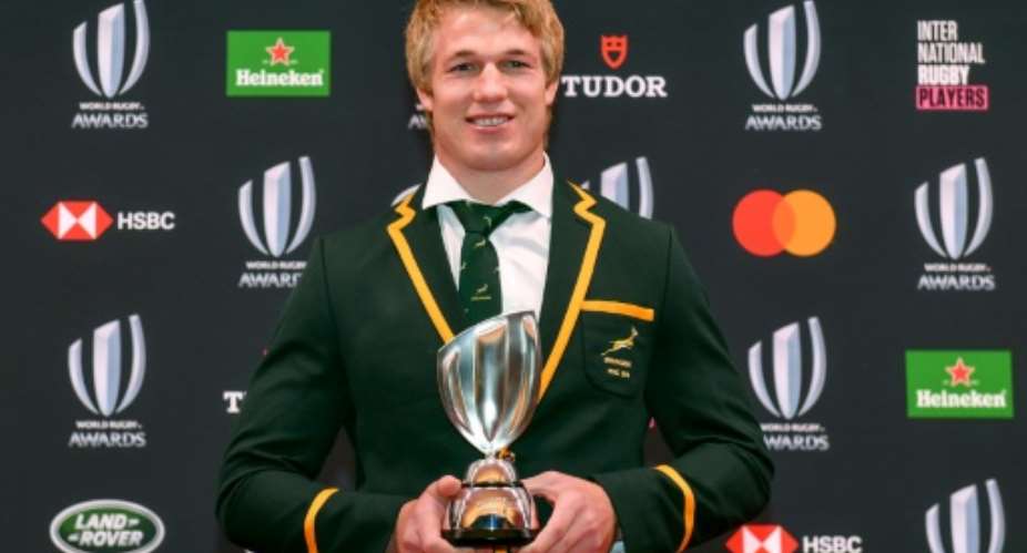 Springbok Pieter-Steph du Toit poses with the 2019 World Rugby Player of the Year trophy at the awards ceremony in Tokyo last November..  By Kazuhiro NOGI AFP