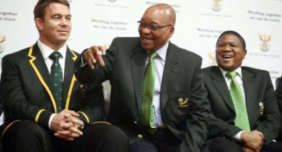 South African President Jacob Zuma shares a joke with Captain of the Springboks John Smit L.  By Paballo Thekiso AFPFile