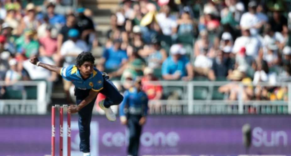 Sri Lanka bowler Lakshan Sandakan delivers a ball to South Africa batsman Mangaliso Mosehle not pictured during the second T20 match on January 22, 2017 at Wanderers Cricket Ground in Johannesburg.  By GIANLUIGI GUERCIA AFP