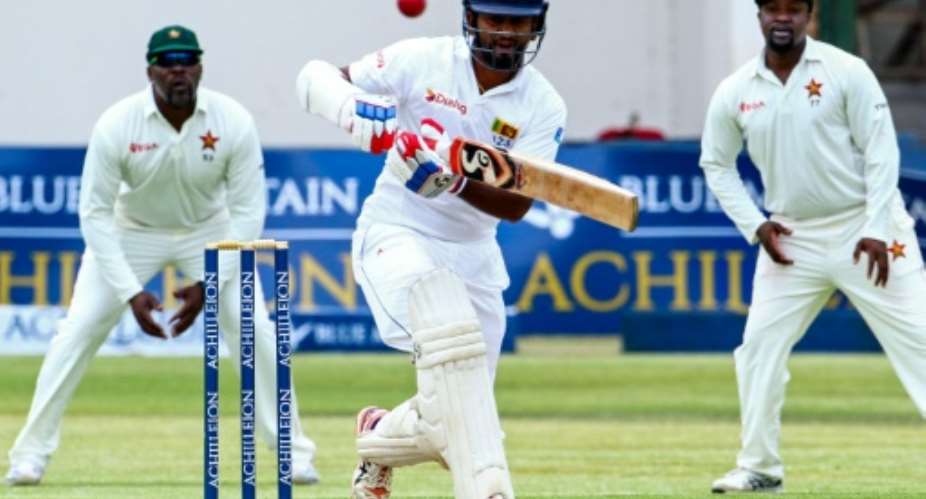 Sri Lanka's Dimuth Karunaratne bats against Zimbabwe in the first innings of the first Test in Harare on October 29, 2016.  By Jekesai Njikizana AFPFile