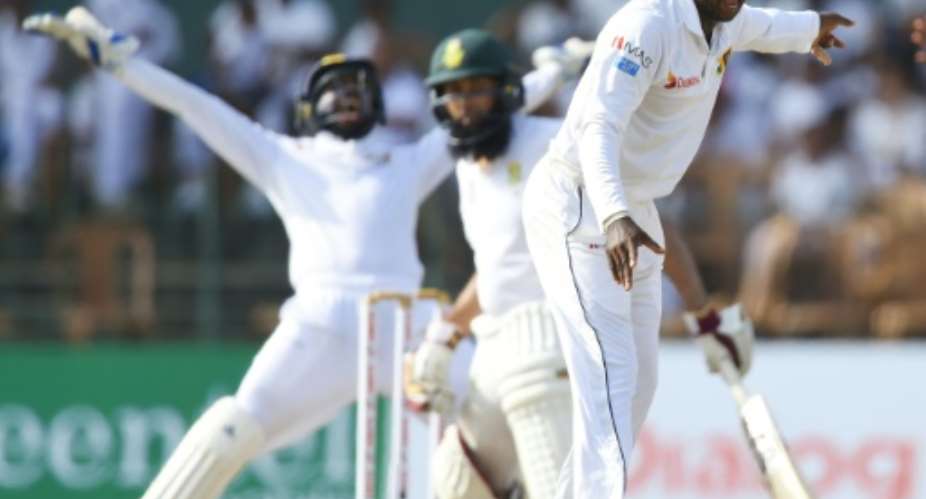 Sri Lanka's spinners ripped through the Proteas batsmen yet again.  By ISHARA S. KODIKARA AFP