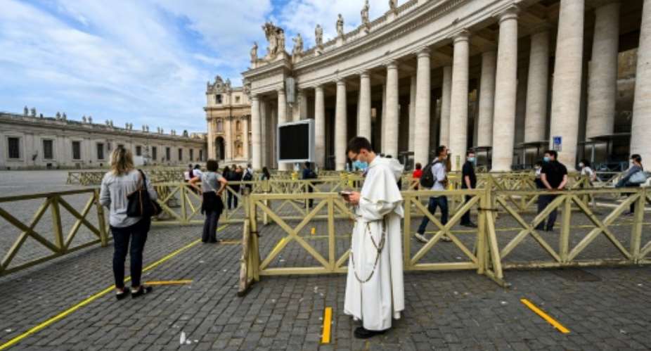 St. Peter's Basilica in the Vatican City was one of the major religous sites to reopen Monday.  By Vincenzo PINTO AFP