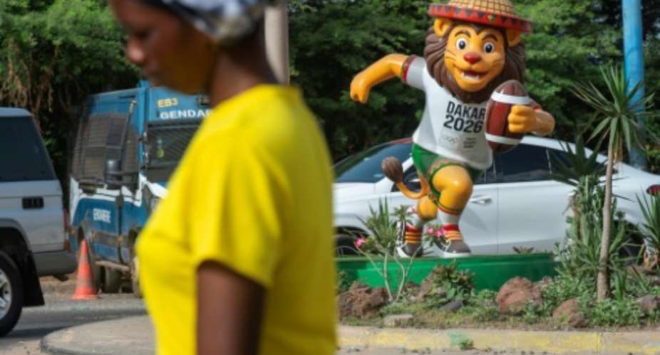 Statues of the Youth Olympics mascot Ayo the lion playing various sports have been installed throughout Dakar.  By SEYLLOU (AFP)
