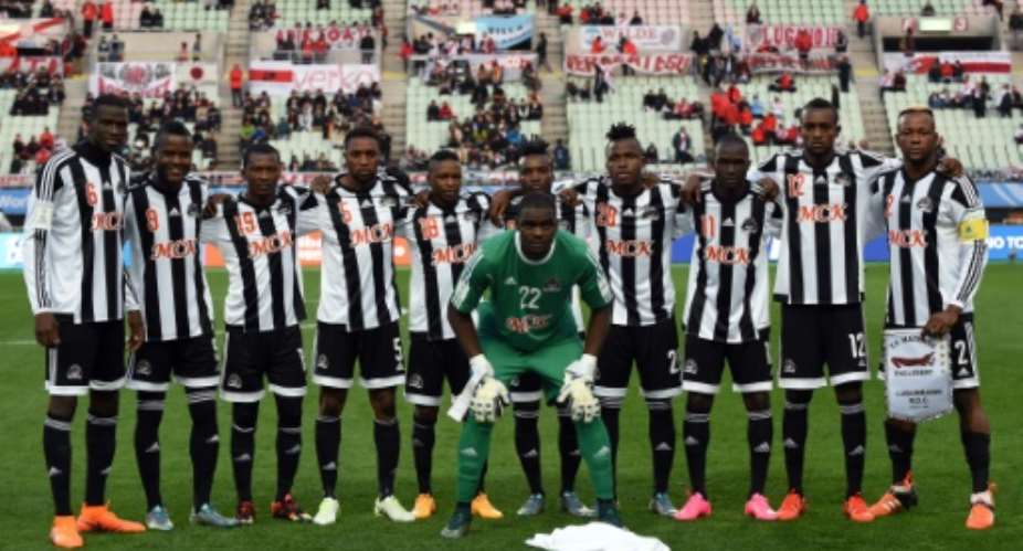 Players of TP Mazembe pose on the pitch prior to their Club World Cup fifth place play-off match against Club America in December 2015.  By Toshifumi Kitamura AFPFile