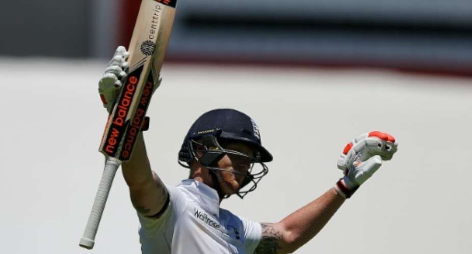 England batsman Ben Stokes celebrates a double century during day two of the second Test against South Africa in Cape Town on January 3, 2016.  By Marco Longari AFP