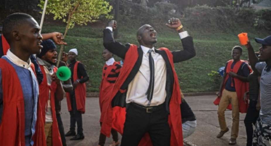 Students of Makerere University protested this week against the official procedure to scrap a presidential age limit from the constitution.  By Isaac Kasamani AFPFile
