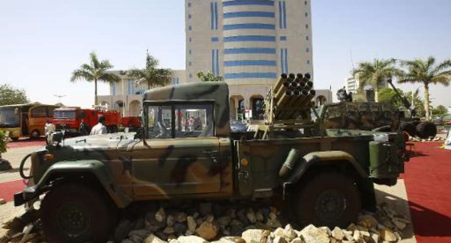 A military vehicle is displayed during an exhibition of Sudanese military industrial products outside the defence ministry in Khartoum on April 22, 2015.  By Ashraf Shazly AFPFile