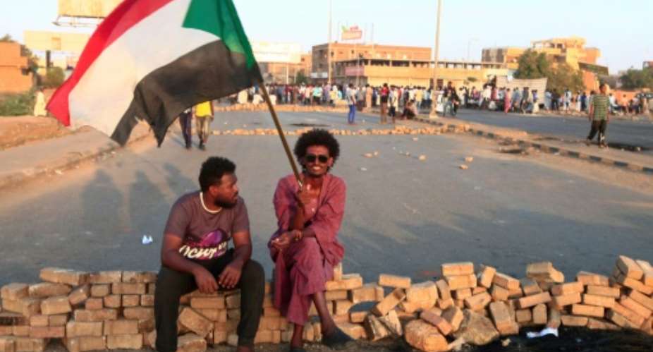Sudan and Israel have moved to normalise ties but many in the North African nation are divided on the issue, which comes amid demonstrations demanding Khartoum's government solve a worsening economic crisis, including these protesters this week.  By Ebrahim HAMID AFP