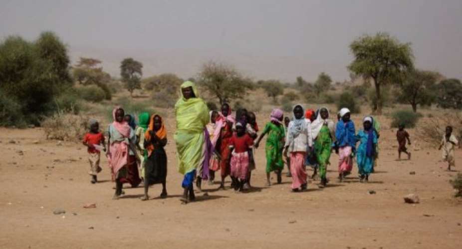 Sudanese women and children are shown March 23, 2011 in Fanga Suk, northern Darfur.  By Olivier Chassot UNAMIDAFPFile