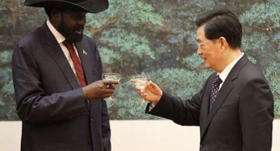 Chinese President Hu Jintao R and South Sudan President Salva Kiir toast after a signing ceremony.  By Kazuhiro Ibuki AFPPOOL