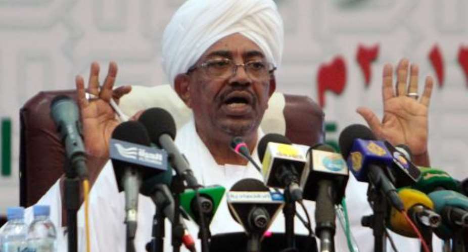 Sudanese President Omar al-Bashir speaks during a press conference in Khartoum, on September 22, 2013.  By Ashraf Shazly AFPFile
