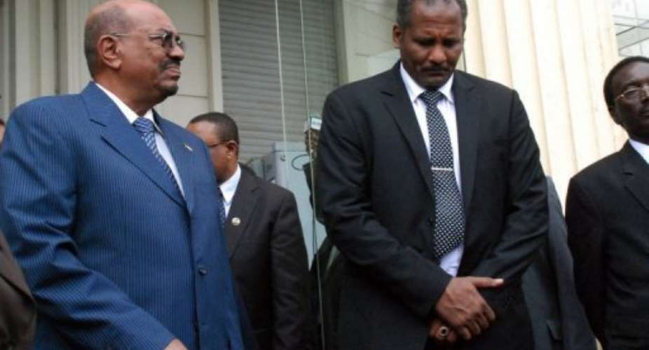Sudanese President Omar al-Bashir L stands alongside members of the Sudanese delegation.  By Peter Martell AFP
