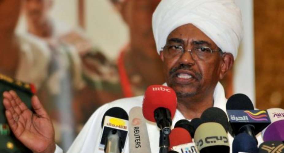 Omar al-Bashirs government has cut five of 31 ministerial posts, official media say.  By Ebrahim Hamid (AFP/File)
