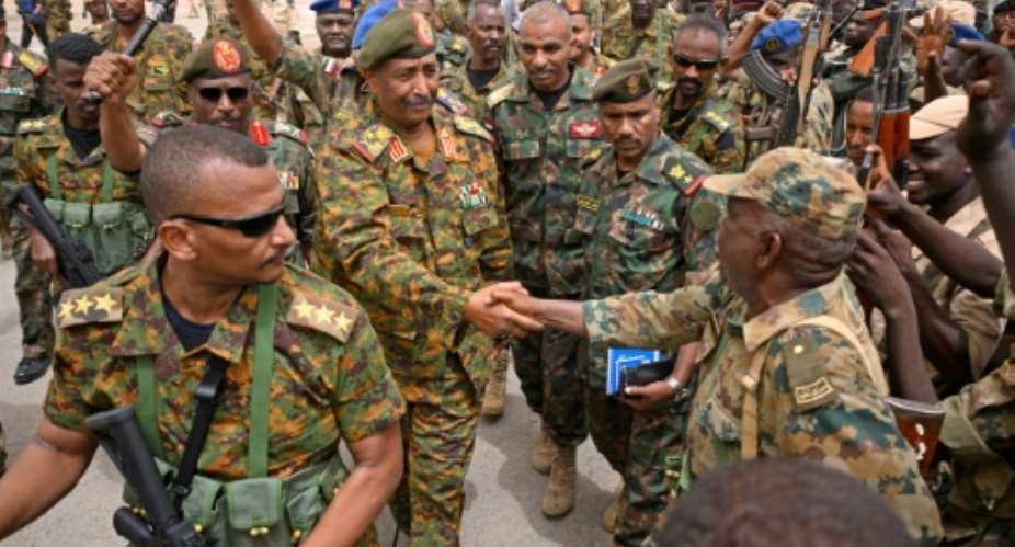 Sudanese army chief Abdel Fattah al-Burhan visits the Flamingo Marine Base in Port Sudan.  By - (AFP)