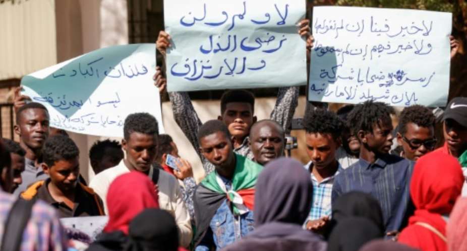 Sudanese citizens protested Tuesday against their relatives allegedly being sent to conflict zones after a UAE based firm hired them as security guards.  By ASHRAF SHAZLY AFP