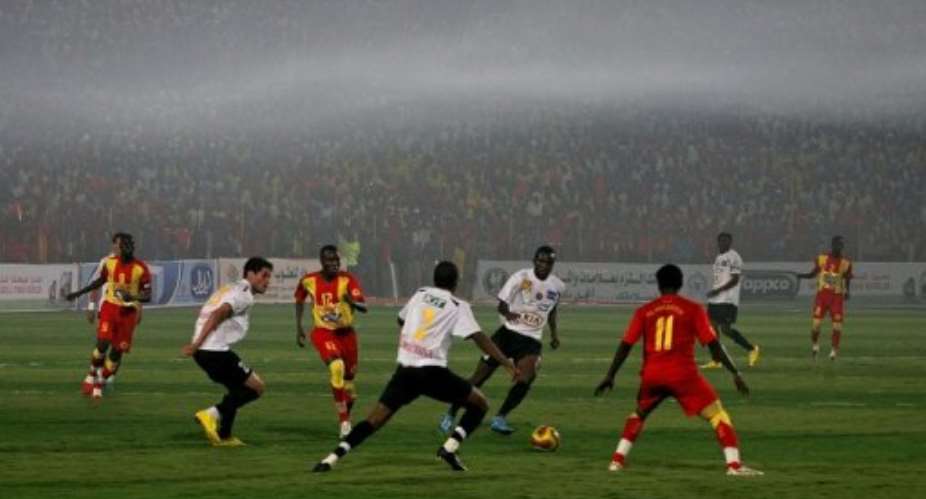 Sudans Al Merreikh (in red) mixes African and local talent.  By Ashraf Shazly (AFP/File)