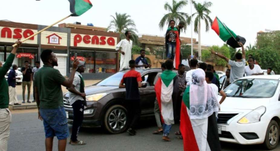 Sudanese demonstrators celebrate in Khartoum on August 3, 2019.  By Ebrahim HAMID AFPFile