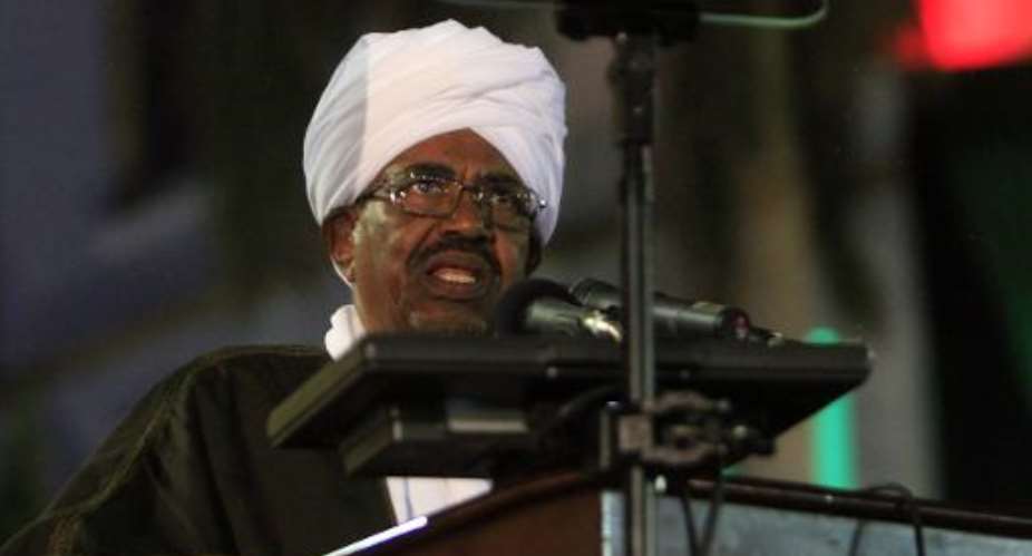 Sudanese President Omar al-Bashir speaks during a celebration to mark 59 years of independence from Britain, in Khartoum on December 31, 2014.  By Ashraf Shazly AFPFile