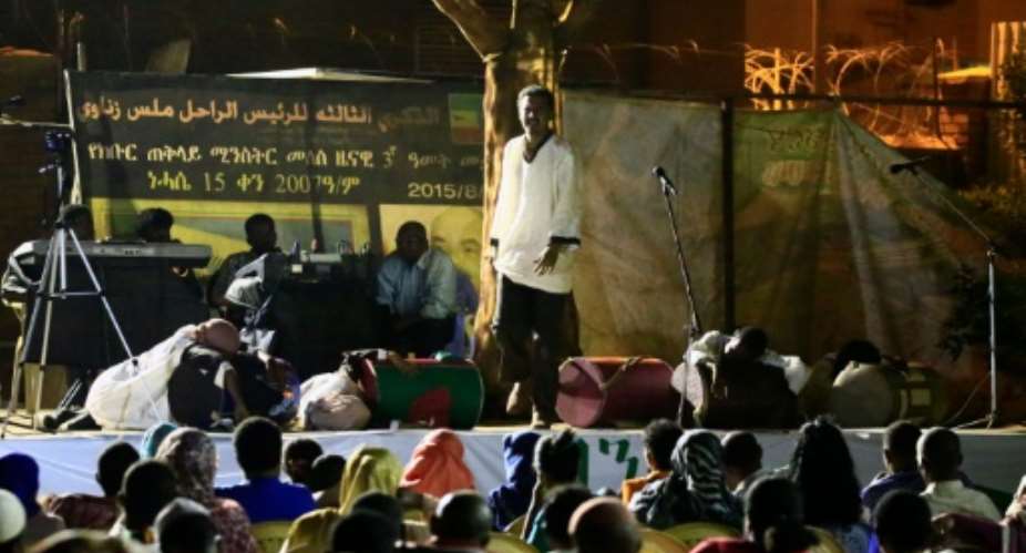 Sudanese actors perform the play 'Boat of Death' at the Ethiopian embassy in the capital Khartoum.  By Ashraf Shazly AFP