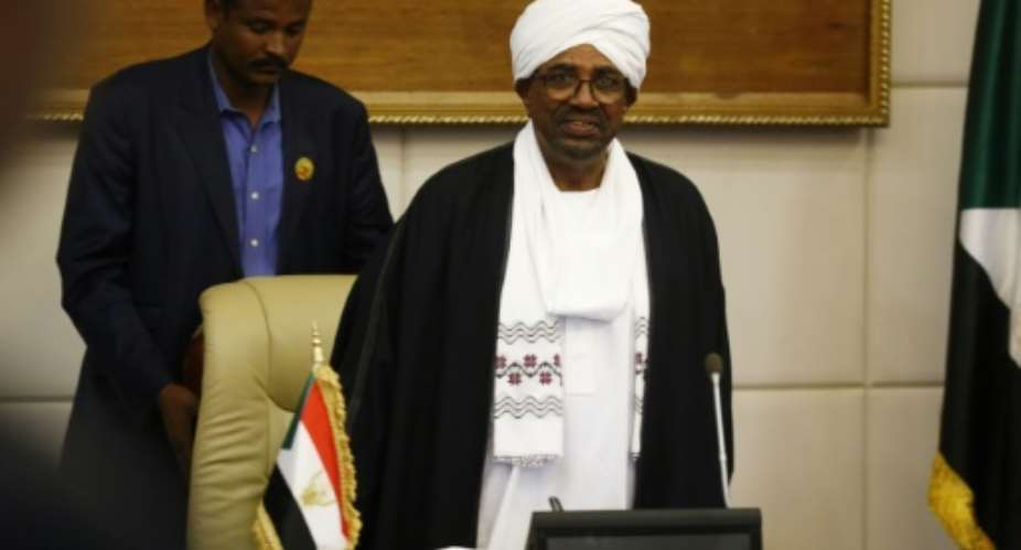 Sudanese President Omar al-Bashir pictured here at a swearing in ceremony for new ministers, named a new Central Bank governor after the previous governor died of a heart attack in June.  By ASHRAF SHAZLY AFP