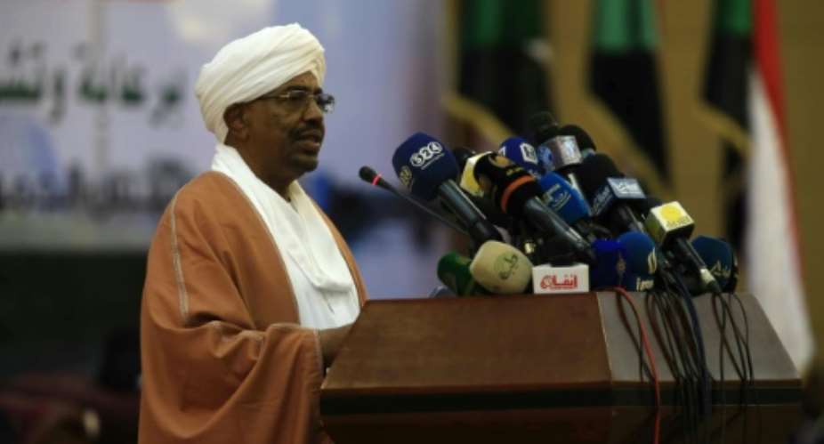 Sudanese President Omar al-Bashir speaks in Khartoum on October 10, 2016.  By Ebrahim Hamid AFP