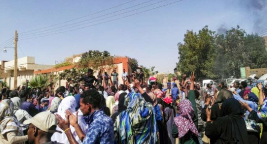 Sudanese protest in Khartoum's twin city of Omdurman on Sunday, despite a nationwide state of emergency.  By - AFP