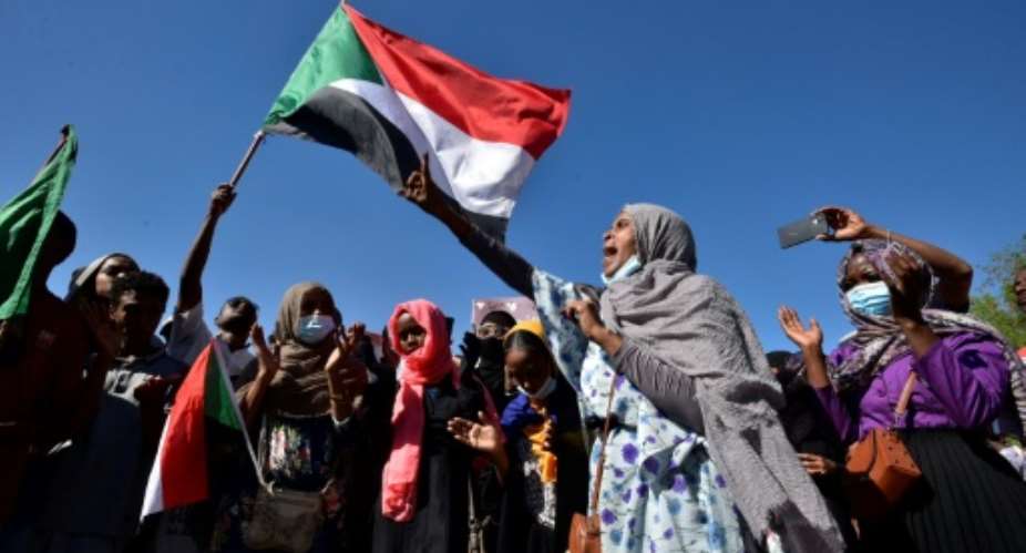 Sudanese protesters against a military power grab in Khartoum on November 25.  By - AFP