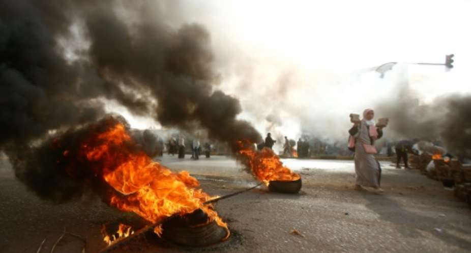 Sudanese protesters had been camped out for weeks outside the army headquarters, calling on the military rulers to cede power to a transitional authority.  By ASHRAF SHAZLY AFP