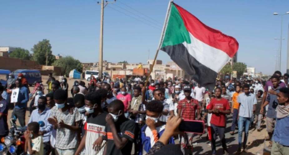 Sudanese protesters have held weeks of rallies since an October 25 power grab by the army, including this demonstration in Khartoum on November 21.  By - AFP