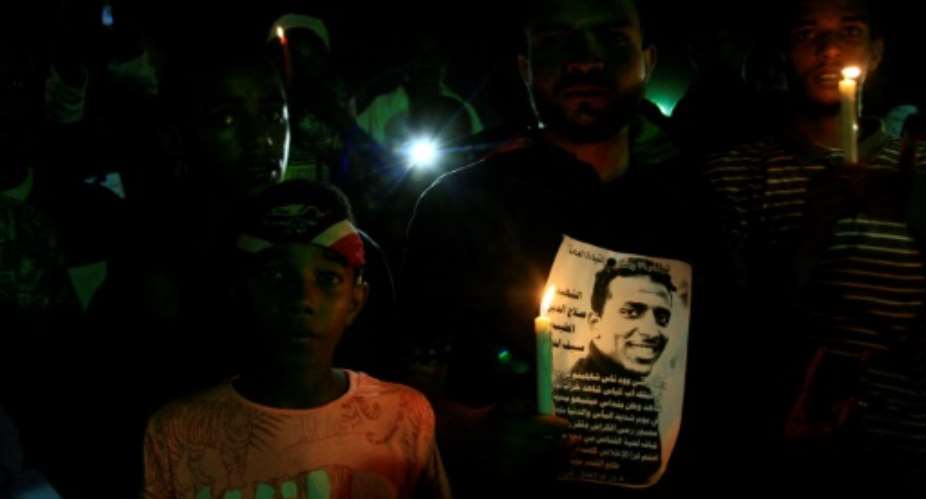 Sudanese protesters have staged vigils calling for justice for those killed on June 3.  By EBRAHIM HAMID AFPFile