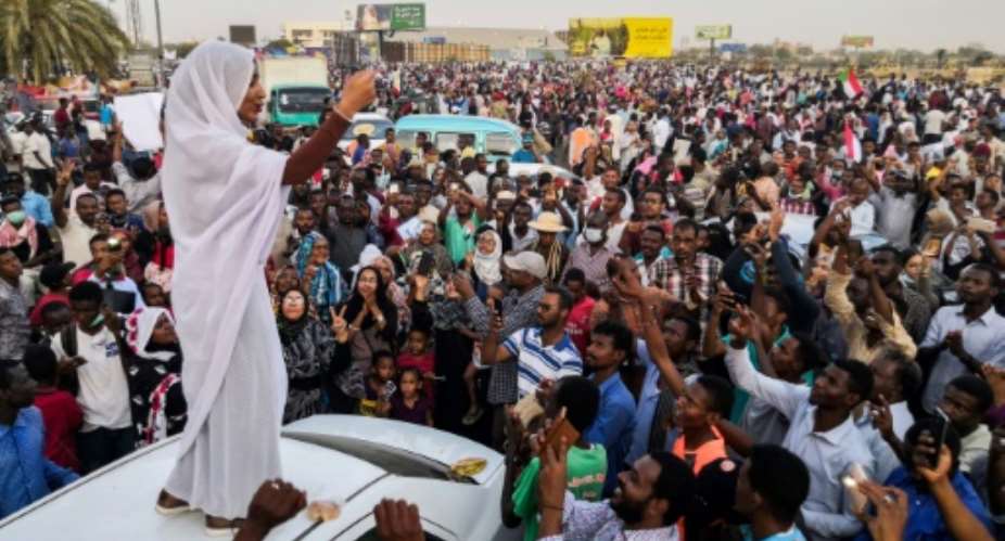 Sudanese student Alaa Salah shot to prominence after an image of her leading demonstrators in chants in Khartoum went viral.  By - AFP