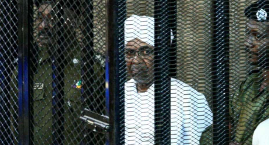 Sudan's ex-president Omar al-Bashir appears in court in Khartoum in August 2019.  By Ebrahim HAMID AFPFile
