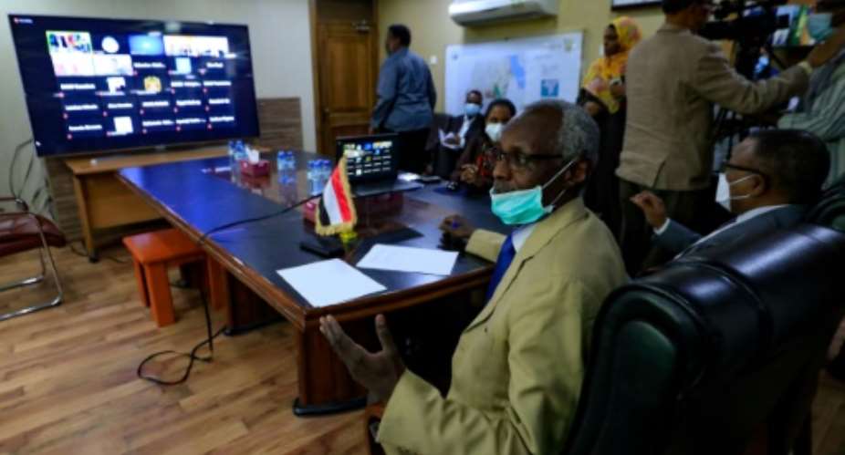 Sudan's Minister of Irrigation and Water Yasser Abbas gestures during talks online with Egypt and Ethoipia over the Grand Ethiopian Renaissance Dam GERD.  By ASHRAF SHAZLY AFP