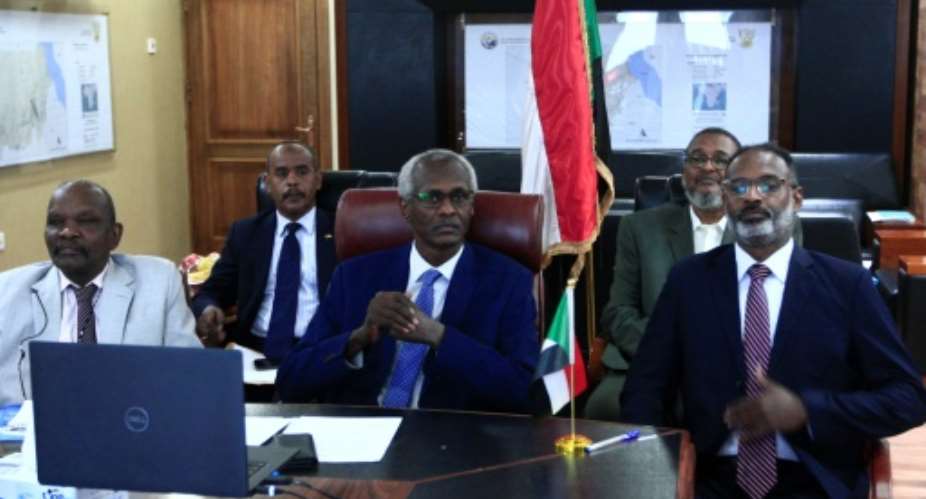 Sudan's Minister of Irrigation and Water Yasser Abbas participates in a videoconference with his Egyptian and Ethiopian counterparts over a giant Blue Nile dam.  By Ebrahim HAMID AFP