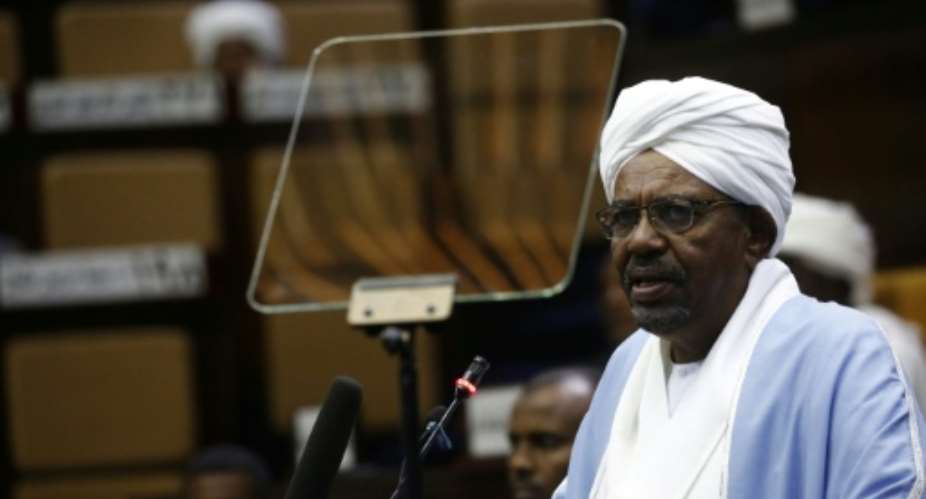 Sudan's ousted president Omar al-Bashir addressing parliament on April 1.  By ASHRAF SHAZLY AFPFile