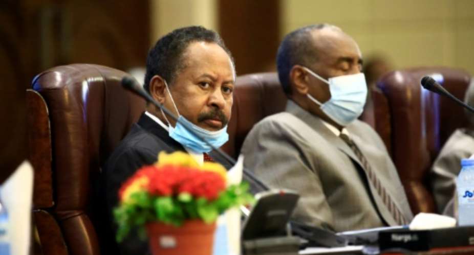 Sudan's Prime Minister Abdalla Hamdok has hailed US plans to remove the northeast African country from its state sponsors of terrorism blacklist.  By ASHRAF SHAZLY AFPFile