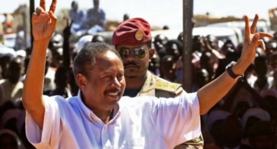 Sudan's Prime Minister Abdalla Hamdok visits a camp for the displaced in El-Fasher, the capital of North Darfur state in the war-devastated western region.  By ASHRAF SHAZLY AFP