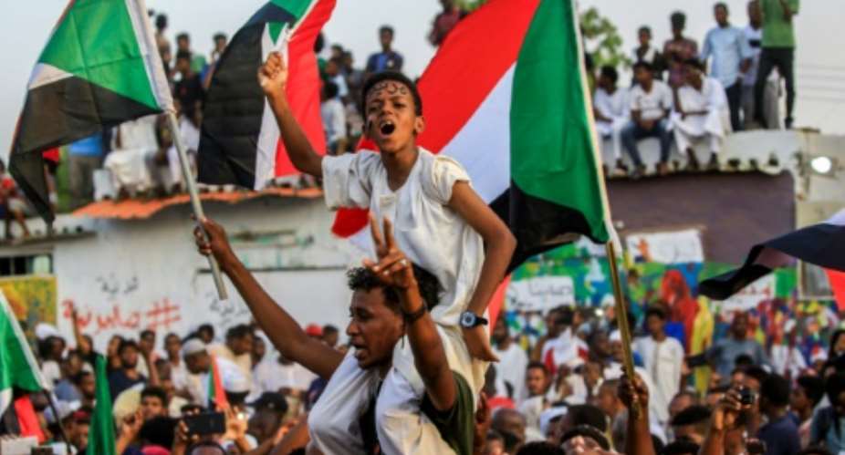 Sudan's ruling military council and protest leaders reached a power-sharing deal in the early hours of Friday.  By ASHRAF SHAZLY AFP