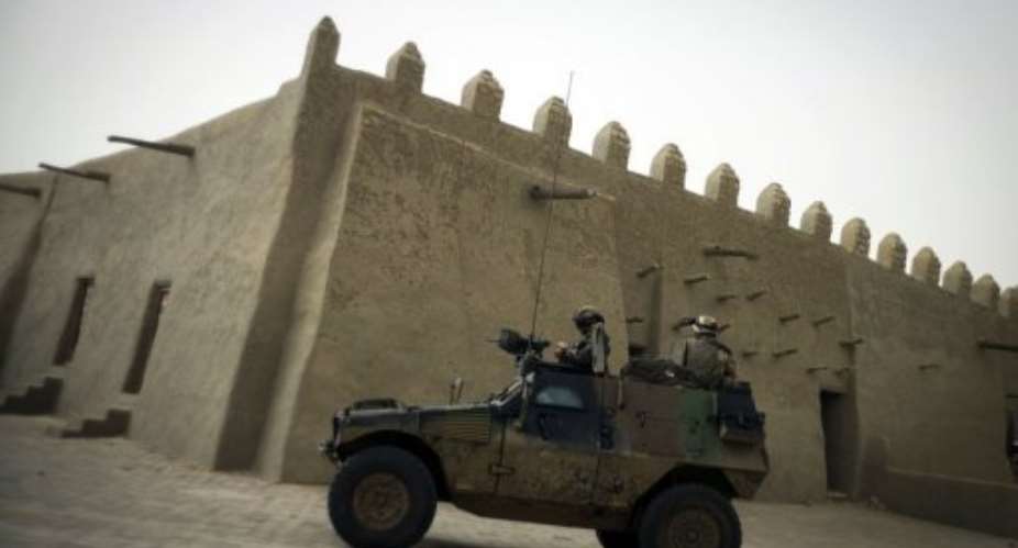 French soldiers patrol in an armoured vehicle on January 31, 2013 in Timbuktu.  By Fred Dufour (AFP)