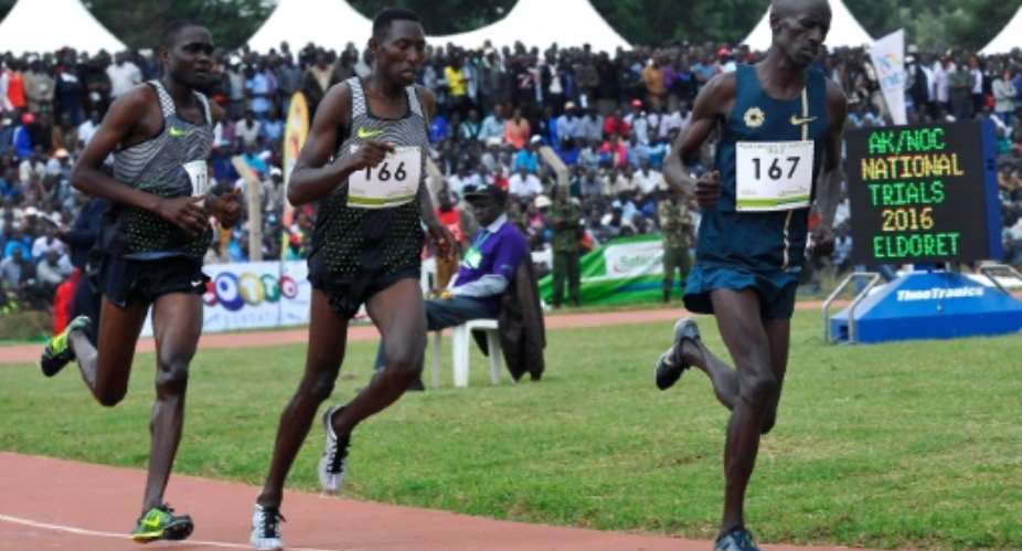Kenya's Olympic steeplechase champion Ezekiel Kemboi R leads the 3000m men steeplechase race during the trials for the Rio Olympic games in Eldoret on June 30, 2016.  By Simon Maina AFPFile