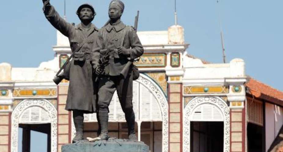 The Demba and Dupont statue, a World War I memorial commemorating the fallen and honouring the brotherhood between Senegal and France, pictured at the Rifleman's Square in Dakar, on November 10, 2013.  By Seyllou AFPFile