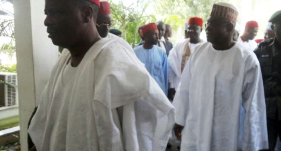 Support for Nigeria's politician Rabiu Kwankwaso, seen here in 2012 when he was Kano state governor, may have gotten popular RB singer Sadiq Zazzabi into hot water with the state censorship board.  By AMINU ABUBAKAR AFPFile